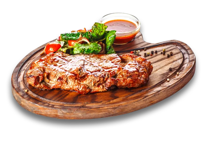 Corte de carne asada con salsas negras